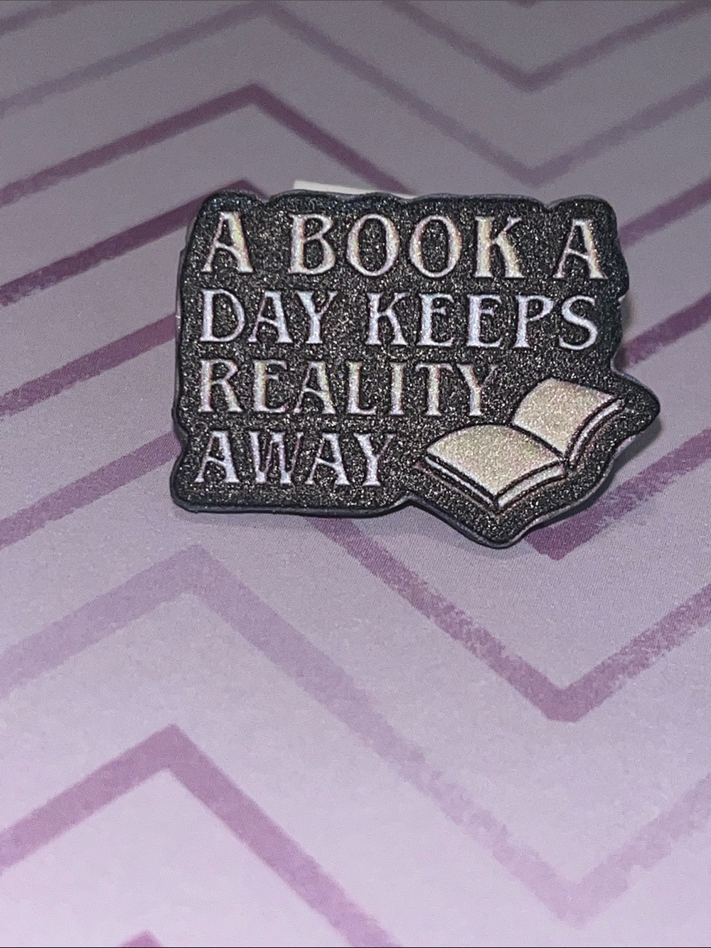 Acrylic pin Yellow Black White “A Book a Day Keeps Reality Away”